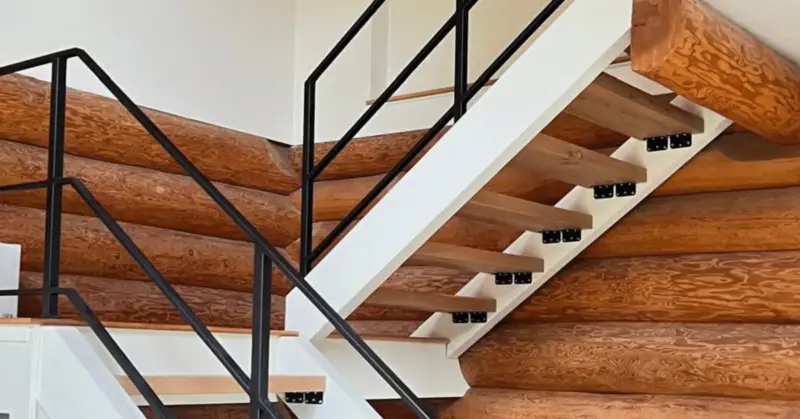 Custom metal railing fabrication process with cutting and welding